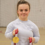 Maisie Summers-Newton, Athelete and Paralympic champion holding 2 gold medals