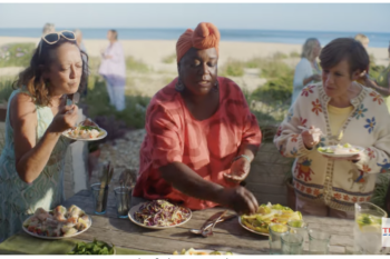 Screenshot from Tesco ad featuring women's wild swimming group